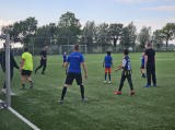 Laatste training S.K.N.W.K. JO10-1 (partijtje tegen de ouders) van woensdag 22 mei 2024 (125/133)